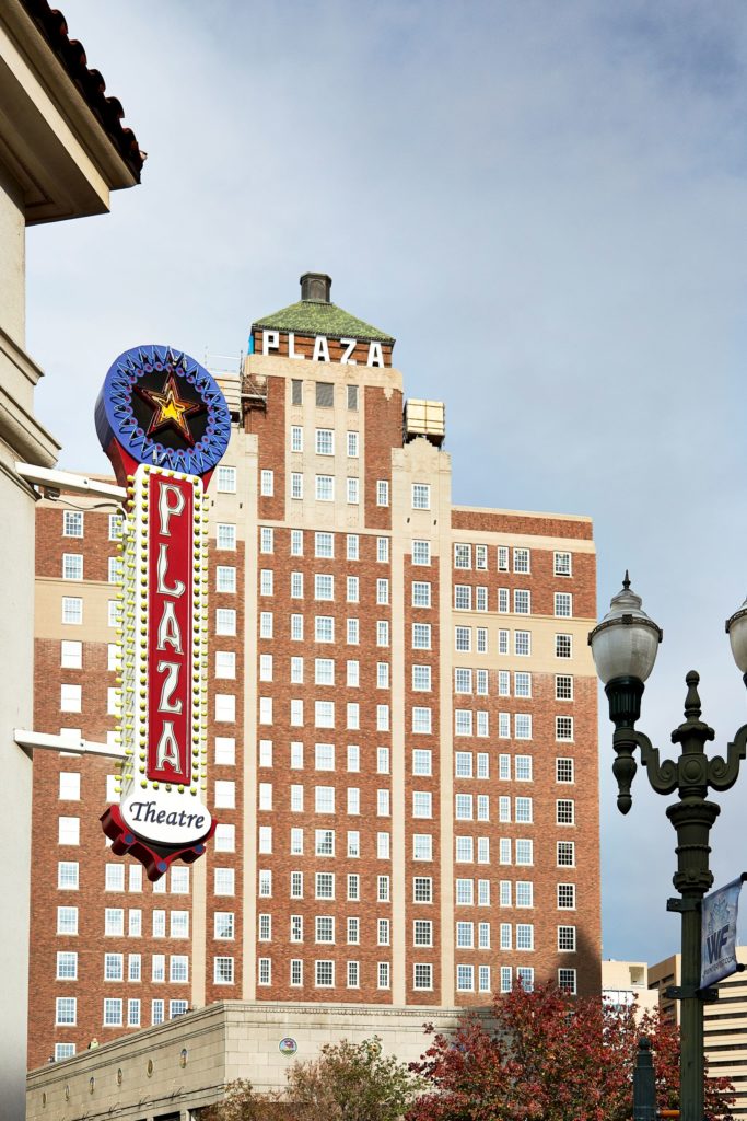 View of Downtown El Paso - Plaza Theatre Sign with The Plaza Hotel Pioneer Park in the background