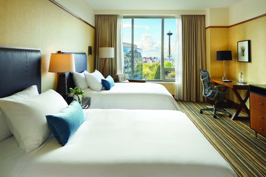 Deluxe Double Room at Pan Pacific Seattle hotel with a city and Space Needle view