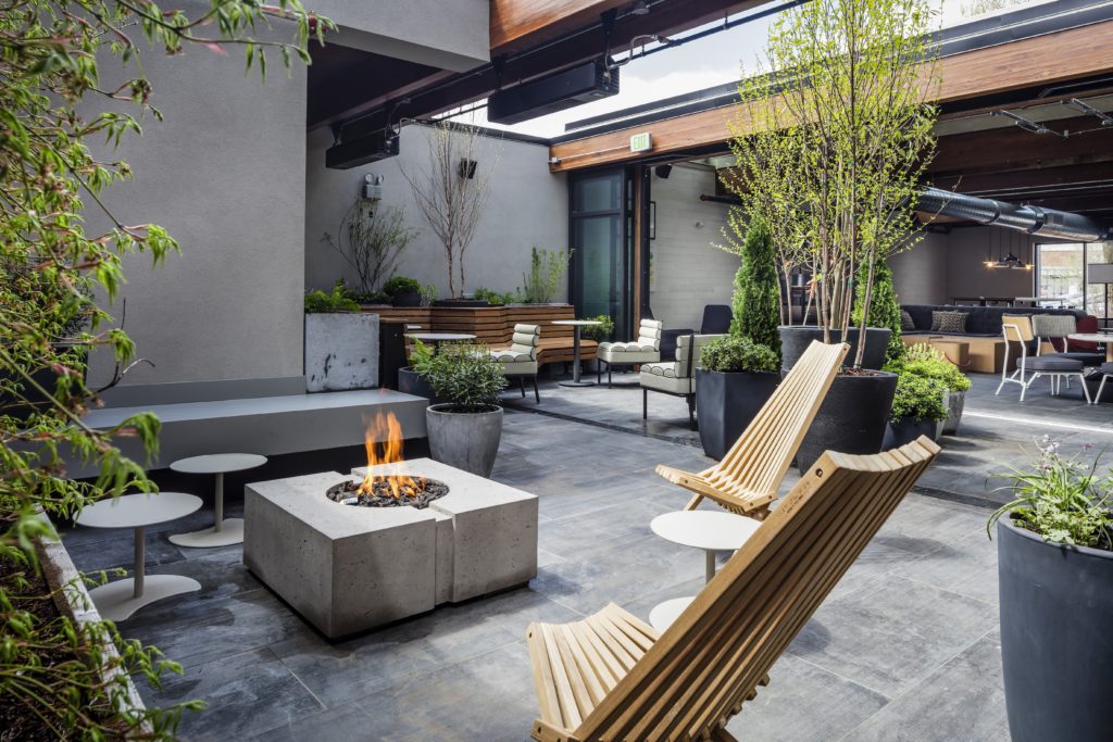 Firepit in outdoor courtyard at Freepoint Hotel in Cambridge, MA