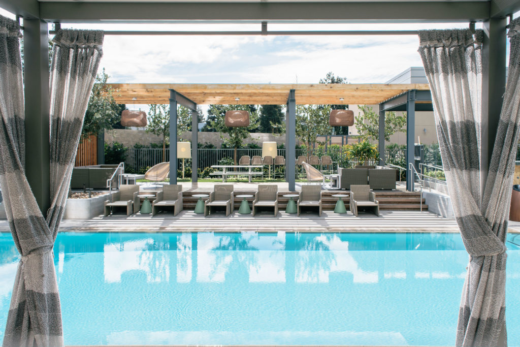 Outdoor pool and lounge chairs at Hotel Nia in Menlo Park