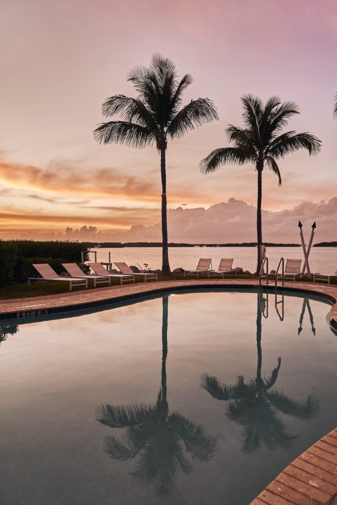 Sunset over pool at Bayside Villas by Islander Resort